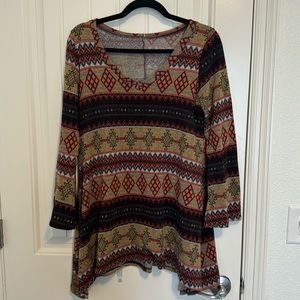 Aztec pattern mini sweater dress with bell sleeves asymmetrical hem